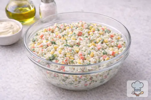 Фото 7-го шага: Салат с крабовыми палочками, кукурузой и яйцом